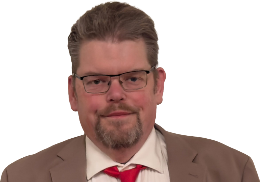 Pressbild av Ingvar Willexberg med mörk bakgrund